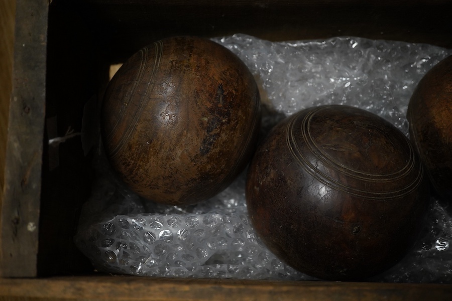 A set of four lignum vitae bowls